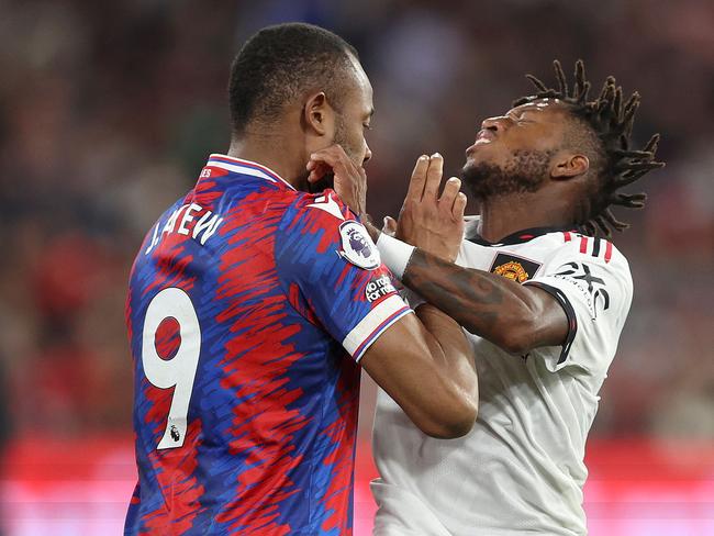 Crystal Palace’s Jordan Ayew and United’s Fred get physical. Picture: AFP