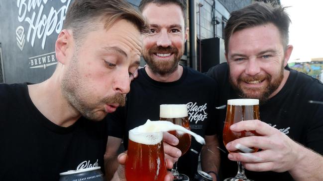 Black Hops Brewing Co founders Eddie Oldfield, Dan Norris and Michael McGovern pictured at their Burleigh business. Picture: Mike Batterham