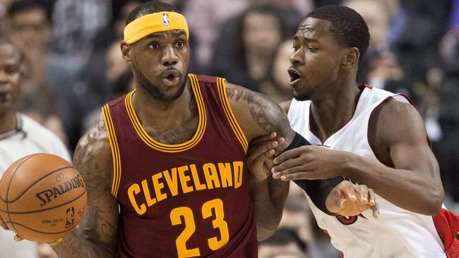 Toronto Raptors' Terrence Ross guards Cleveland Cavaliers' LeBron James.