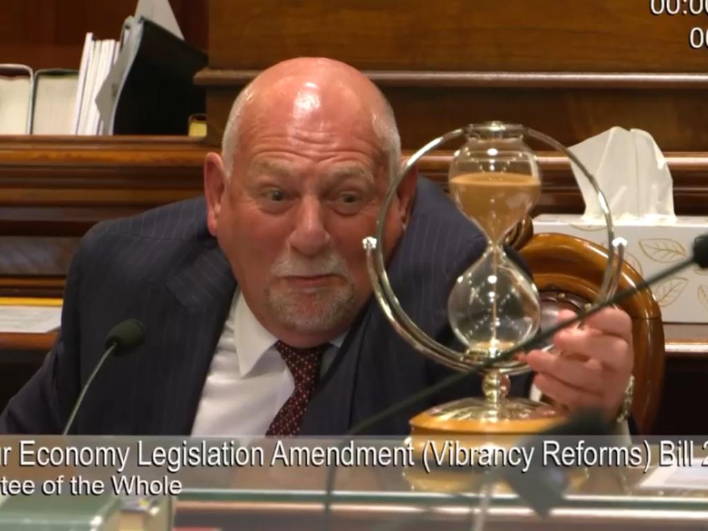 Independent MP Rod Roberts watches as the hourglass King Charles gifted the Legislative Council during his visit last week "malfunctioned". Roberts blamed "operator error"