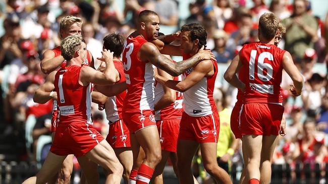 The Swans flocked to Lance Franklin after slotting his first goal. Picture: Getty Images