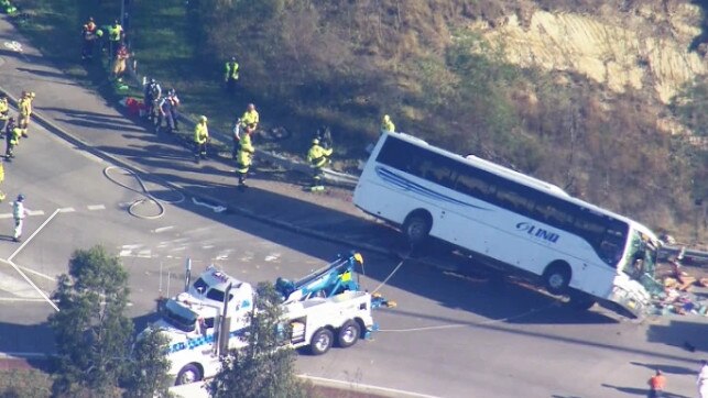 The bus is righted with a tow truck. Picture: 9 News