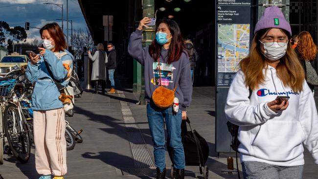 Melbourne residents have been urged to wear masks in public. Picture: Jake Nowakowski