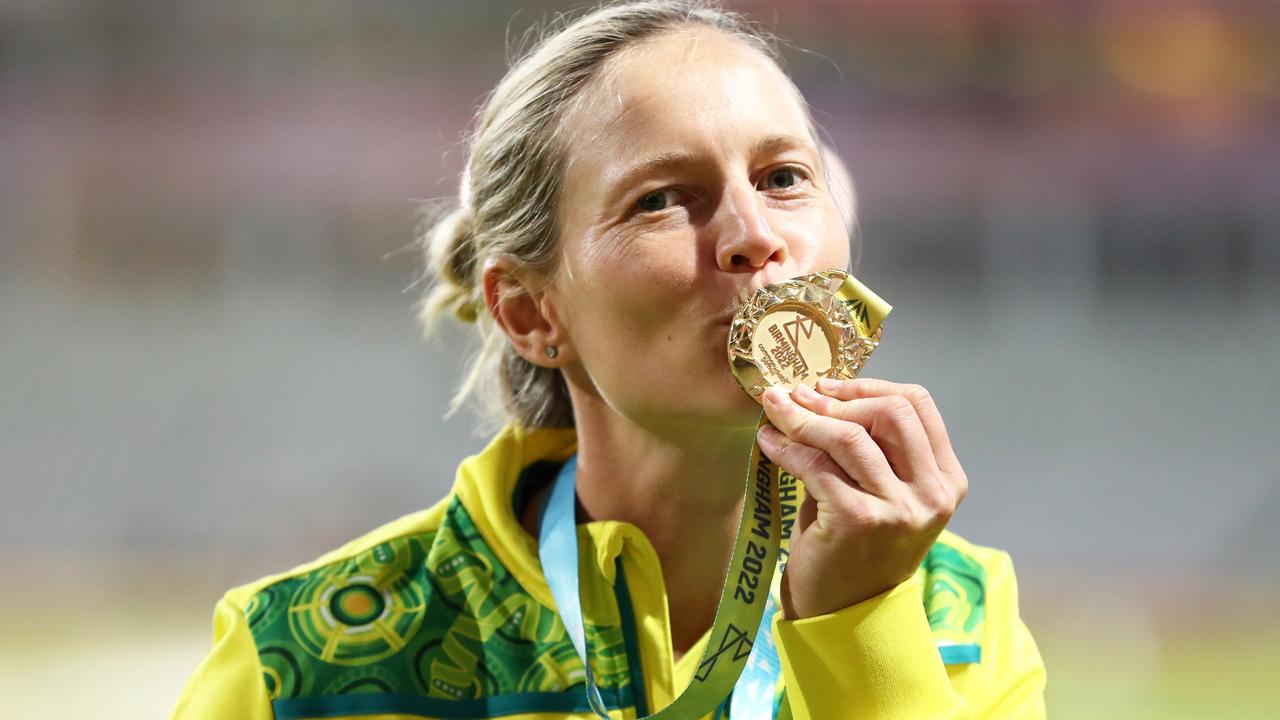 Meg Lanning celebrates after being presented with a gold medal at the Birmingham 2022 Commonwealth Games.