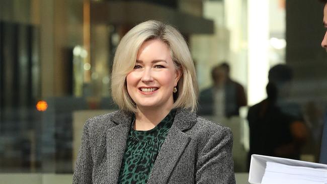 Louise Morton leaves District Court in Brisbane where she is being sued by luxury builder Thallon Mole over unpaid construction bills on her $6m trophy home. Picture: Liam Kidston.