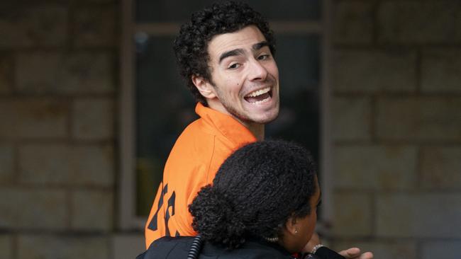 Luigi Mangione being taken into the Blair County Courthouse on December 10 in Hollidaysburg, Pa. Picture: Benjamin B. Braun/Pittsburgh Post-Gazette via AP