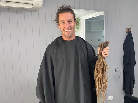 Warwick resident Russell Stewart decided to chop off his dreadlocks after 12 years and raise money for a good cause while doing so.