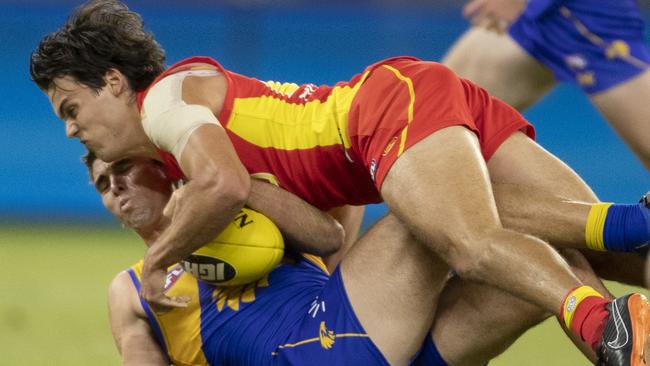 Jack Bowes tackles West Coast’s Jamie Cripps last week. Picture: AAP