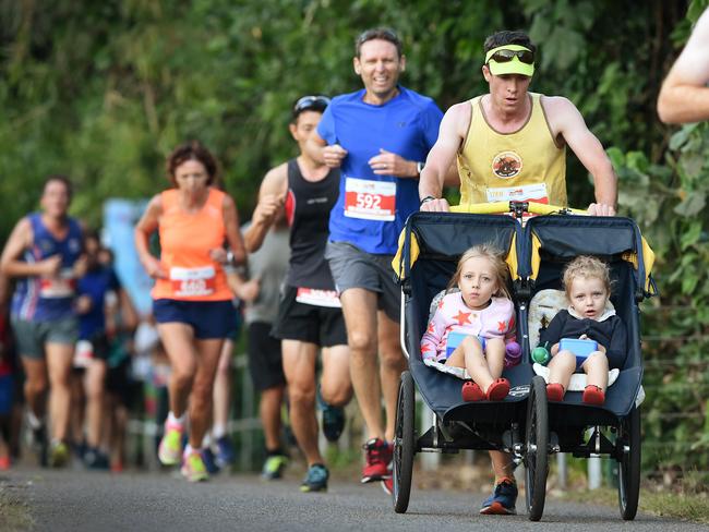 City2Surf 2017. Paul McDonald, 35, Larrakeyah put in a family effort and pushes his two daughters, Grace, 3, and Audrey, 5 along the course. PICTURE: Patrina Malone