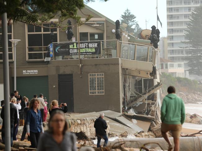 Locals check out the Collaroy Beach Club yesterday. Picture: John Grainger