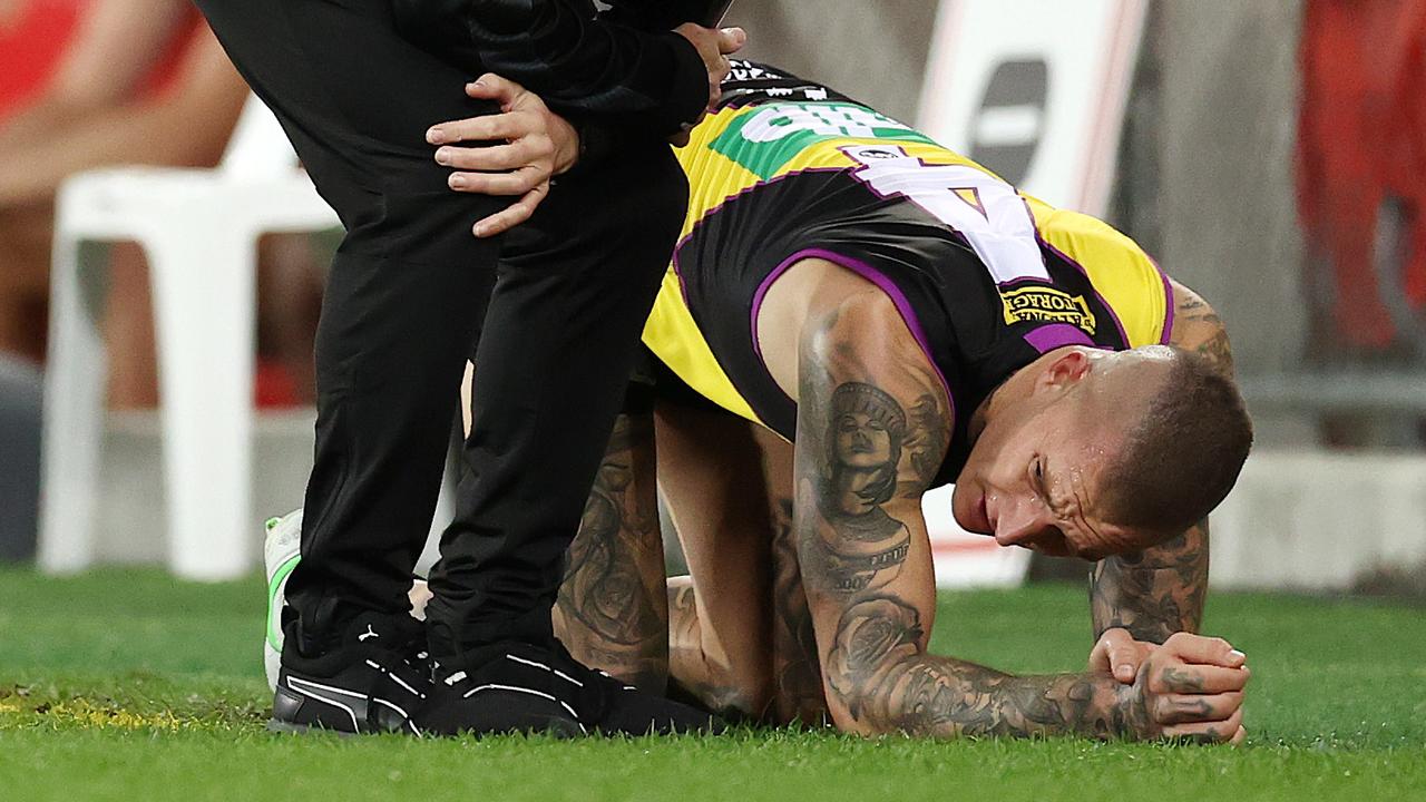 Dustin Martin on all fours after the heavy collision with Lion Mitch Robinson. Picture: Michael Klein