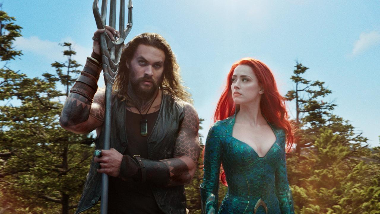 Jason Momoa and Amber Heard in a scene from the movie Aquaman. Picture: Warner Bros.