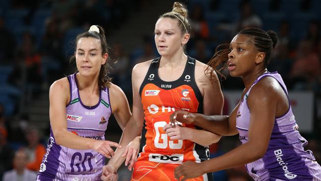 Ruby Bakewell-Doran and Eboni Usoro-Brown keep an eye on Giants star Jo Harten.