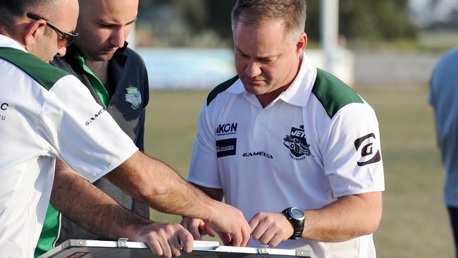 Anthony Rock flips the magnets during his time at Greenvale.