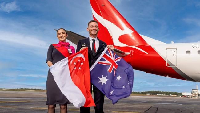 Staff celebrate Qantas' announcement of a new Darwin-Singapore route launching 2024. Picture: Supplied/Qantas