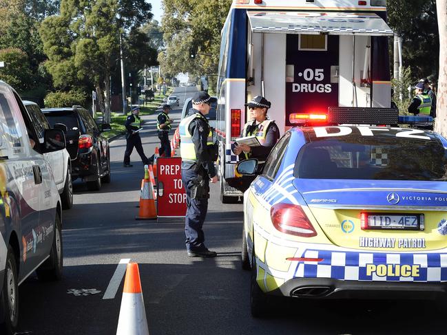 120 cops in Banyule today as part of Operation Influx. Booze bus and the AMG Mercedes on Southern Rd in Heidelberg West, one of many locations. Picture: Josie Hayden