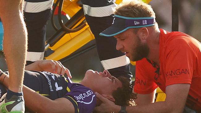 MELBOURNE, AUSTRALIA - FEBRUARY 23: Hugo Peel of the Storm receives medical attention after a collision during the 2025 NRL Pre-Season Challenge match between Melbourne Storm and North Queensland Cowboys at Casey Fields on February 23, 2025 in Melbourne, Australia. (Photo by Morgan Hancock/Getty Images)