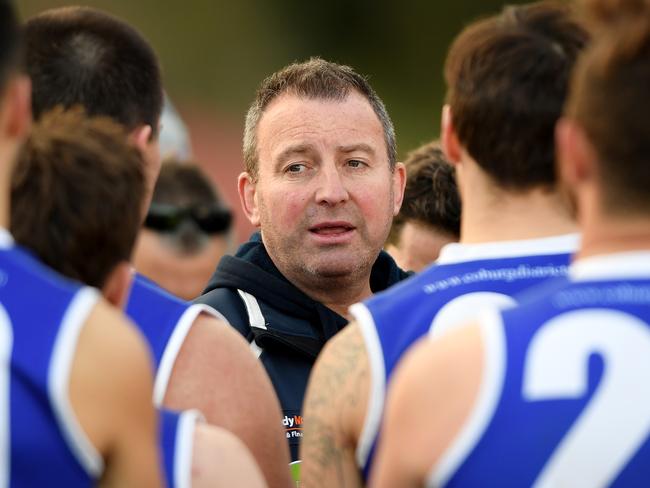 Coburg Districts coach Chris Tankard addresses his players earlier this season. Picture: Andy Brownbill