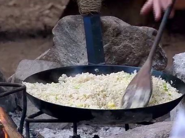 Dinner ... Julie Goodwin whips up a meal with a piece of contraband ginger. Picture: Channel 10