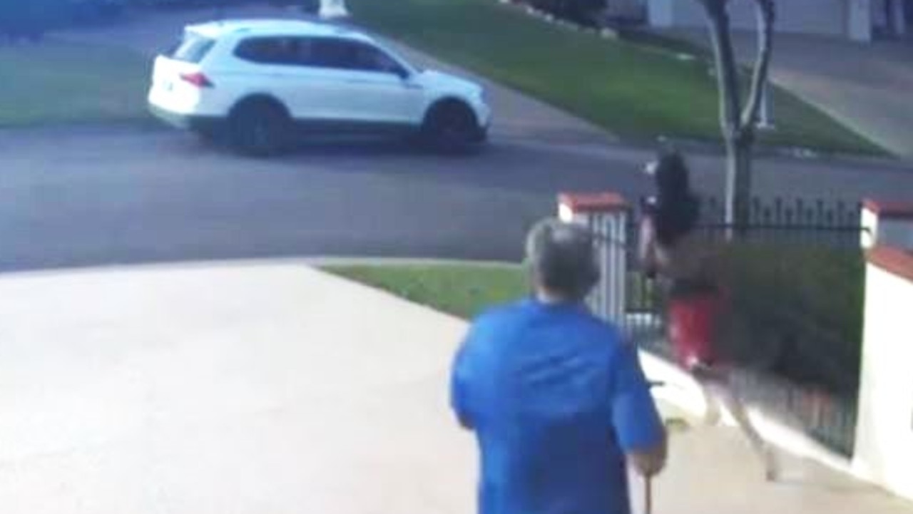 CCTV shows the masked teens creeping into the Minaret Way yard in Mount Louisa before the homeowner watering his plants catches them in the act and on May 5.