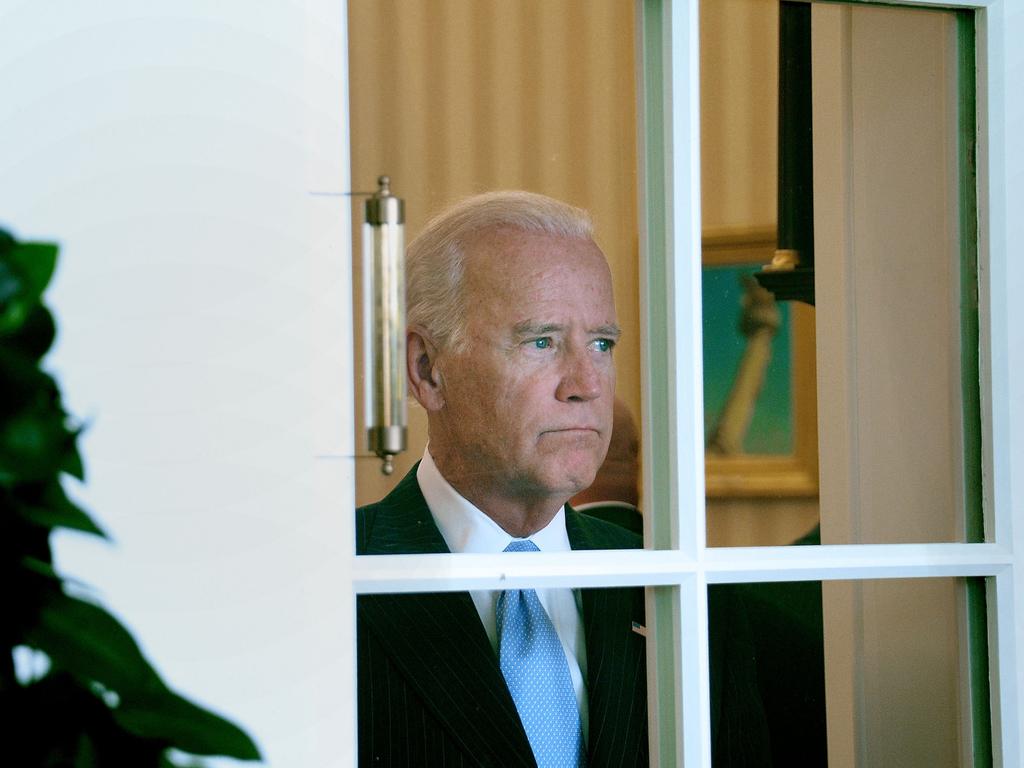 A younger looking Joe Biden under President Barack Obama in the Oval Office of the White House on September 18, 2014. Picture: Getty Images