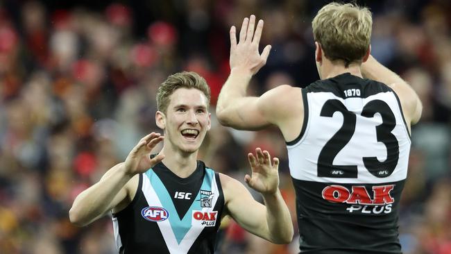 Kane Farrell celebrates one of his three goals with Jack Watts. Picture SARAH REED