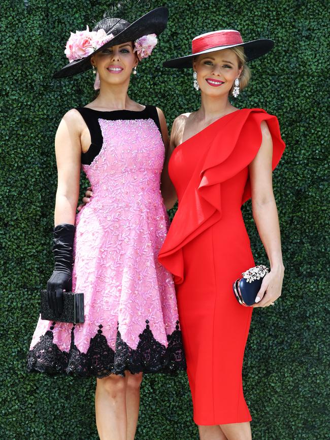 Racegoers Holly Turner (left) and Brittany Baldwin attend Melbourne Cup Day at The Gold Coast Turf Club. Photograph: Jason O’Brien.