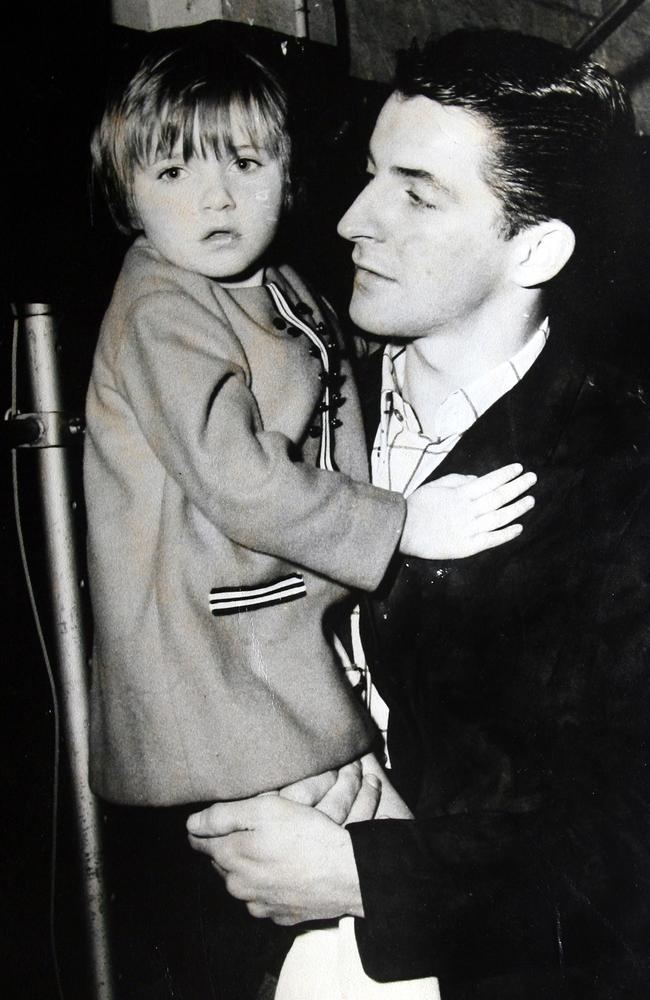 Les Kane holding his then 5-year-old daughter Suzanne Kane. Les was shot in his Wantirna home in 1978 with his wife and children close by.