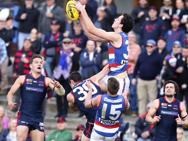 Darcy Fort soars over the pack. Picture: Sarah Reed