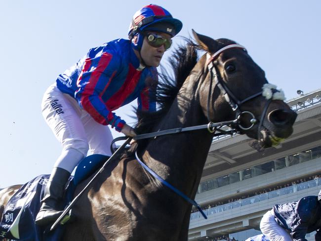 Jockey Michael Walker rides Prince Of Arran of Great Britain and Jockey Ryan Moore rides Anthony Van Dyck of Ireland (unplace) in race 4, the The Longines Hong Kong Vase, during the Hong Kong international races at Sha Tin, Sunday, December 8, 2019. (AAP Image/ Vince Caligiuri) NO ARCHIVING, EDITORIAL USE ONLY