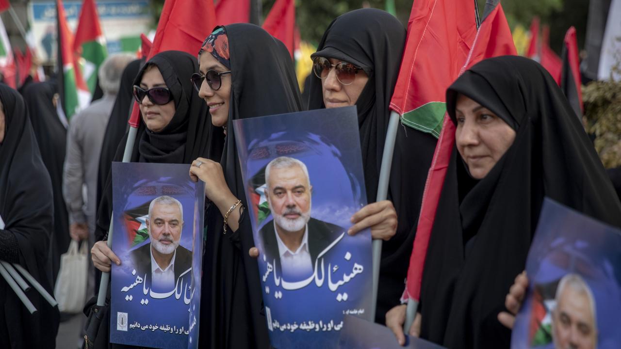 Iranians protesting against the killing of Haniyeh. Picture: Majid Saeedi/Getty Images