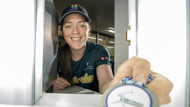 Australian softballer Rachel Lack at her family factory which makes trophies and medals.