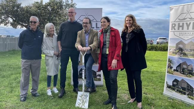 Mayor Michael Whelan, Marilyn Jamieson, Justin Jamieson, Martin Pakula, Bass MP Jordan Crugnale and Bass Coast Council CEO Ali Wasti at the Rhyll brewery and distillery site.