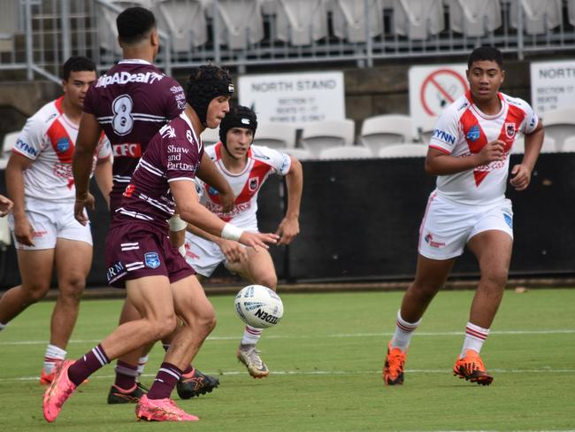 Max Davies kicks for the line. Picture: Sean Teuma