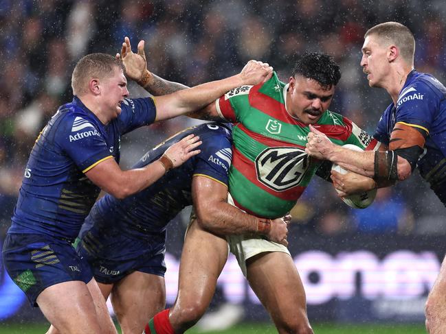 SYDNEY, AUSTRALIA - JULY 04: Latrell Mitchell of the Rabbitohs is tackled during the round 18 NRL match between Parramatta Eels and South Sydney Rabbitohs at CommBank Stadium, on July 04, 2024, in Sydney, Australia. (Photo by Cameron Spencer/Getty Images)