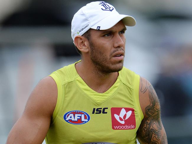 SPORT - The Fremantle Dockers train ahead of their season opener on Sunday. Photo by Daniel Wilkins. PICTURED- Harley Bennell walks the boundary during training