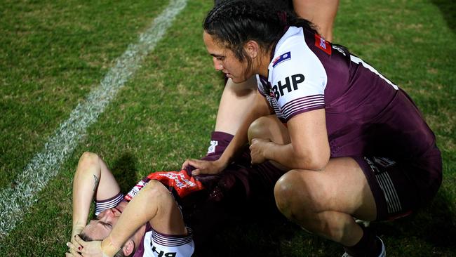 Chelsea Baker of the Maroons is consoled by Tazmin Gray (right) following their loss to NSW. Picture: AAP Image