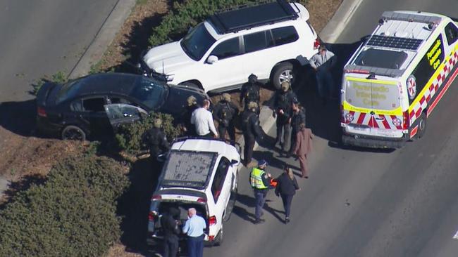 Two 21-year-old men were arrested after the pursuit, that included officers shooting at the car, through Western Sydney. Picture: Nine News