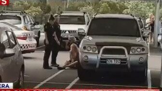 A crime scene was set-up after police shot at a car believed to be stolen at an Upper Coomera shopping centre. Photo: Channel 7 News. 