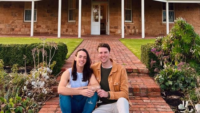 Sydney comedian Mitchell Coombs with his partner Sean at the McLeod's Daughters homestead. Picture: Mitchell Coombes