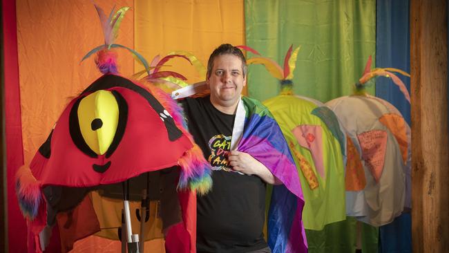 Tas Pride treasurer Vincent Bound with the World Pride Rainbow Caterpillar at Long Gallery, Hobart. Picture: Chris Kidd