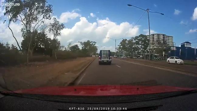 Cop car’s merging near miss