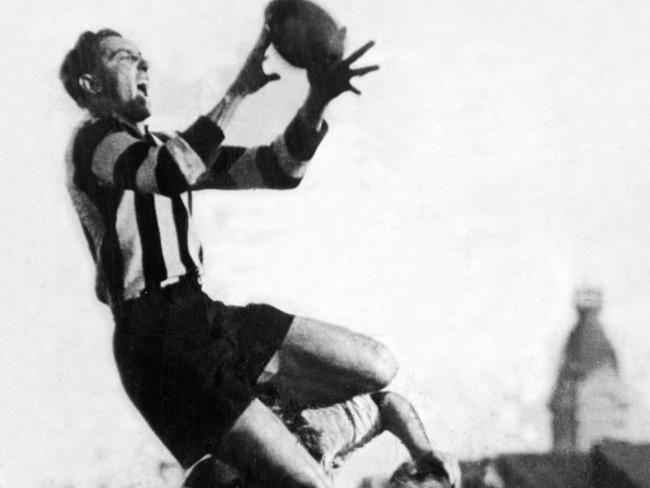 Collingwood forward Ron Todd soars for a mark against St Kilda at Victoria Park during the 1930s.