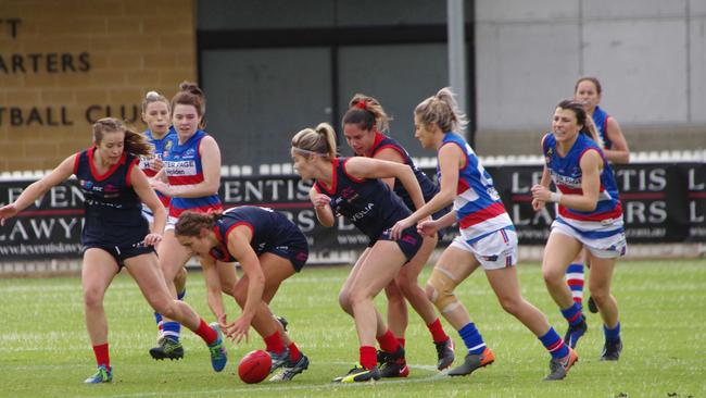 Norwood and Central players battle for the ball during their round 10 SANFLW clash at Alberton Oval. Picture: John Emery