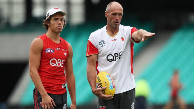 Ollie Florent getting some tips from AFL legend Tony Lockett. Picture: Phil Hillyard