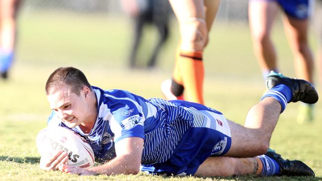 Tugun Seahawks (blue) vs. Southport Tigers at Tugun. A Grade. Zac Beecher scoring a try. 6 June 2021 Tugun Picture by Richard Gosling