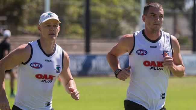 Port Adelaide’s midfield pairings will work to greater depth this AFL season and include star combinations such as Robbie Gray, left, and Brisbane recruit Tom Rockliff. Picture: Ben Macmahon (AAP)