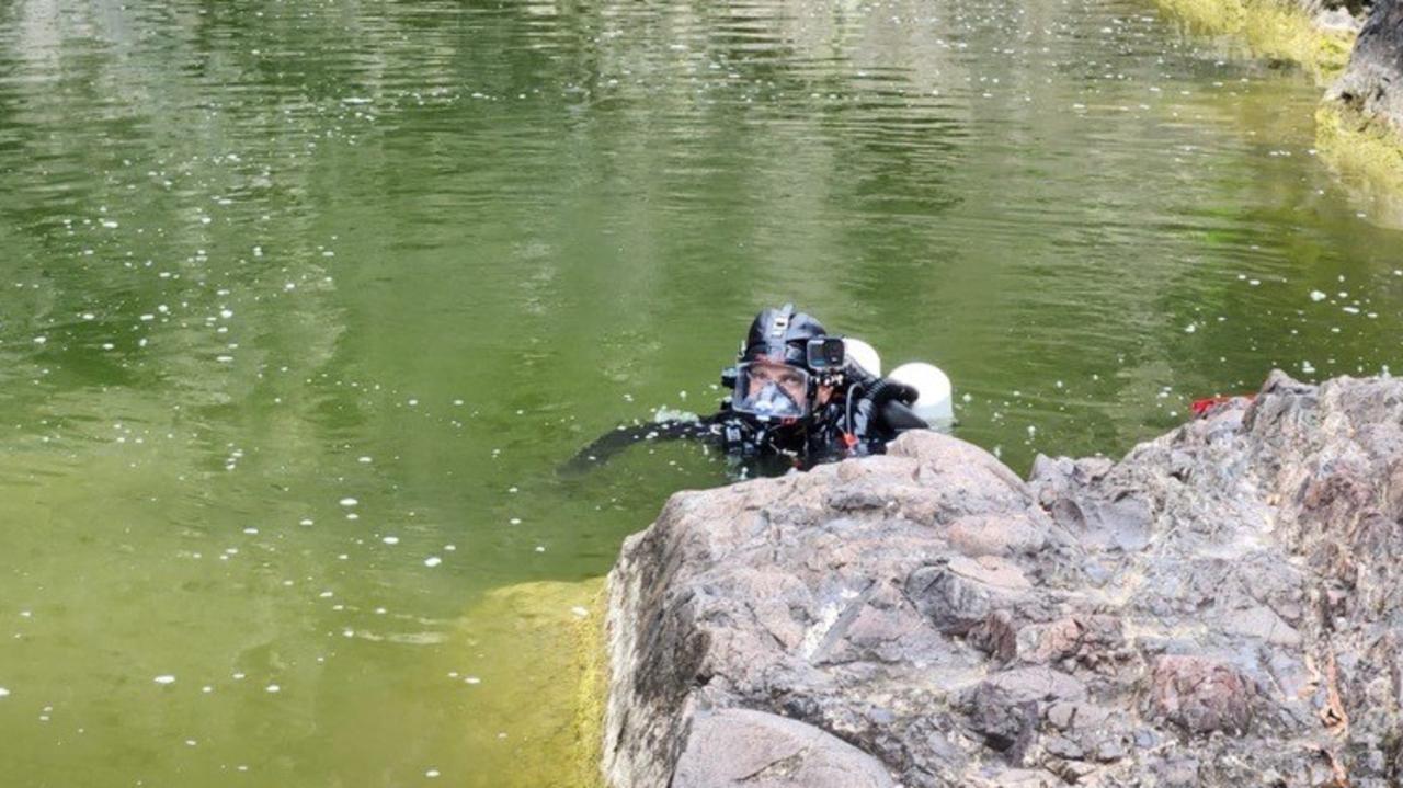 Police divers search Kinbombi Falls, west of Gympie and about 10 minutes from Goomeri, looking for missing man Jack McLennan in February.