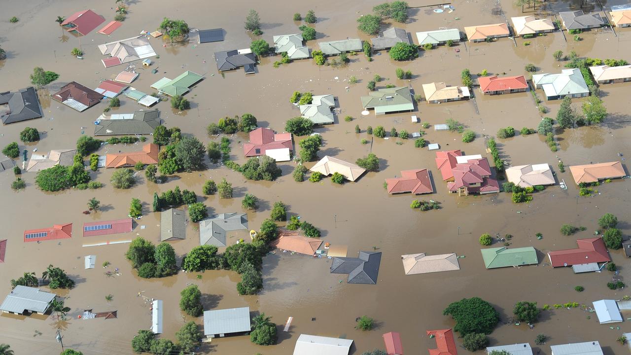 Homes in the town of Ipswich west of Brisbane are inundated by flood waters Jan. 12, 2011. (AAP Image/Dave Hunt)