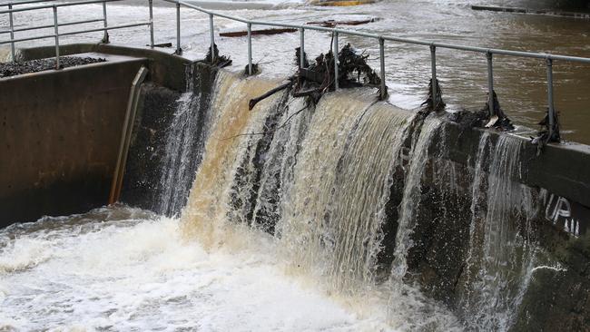 Flooding at Parramatta Weir on Saturday. Picture: David Swift